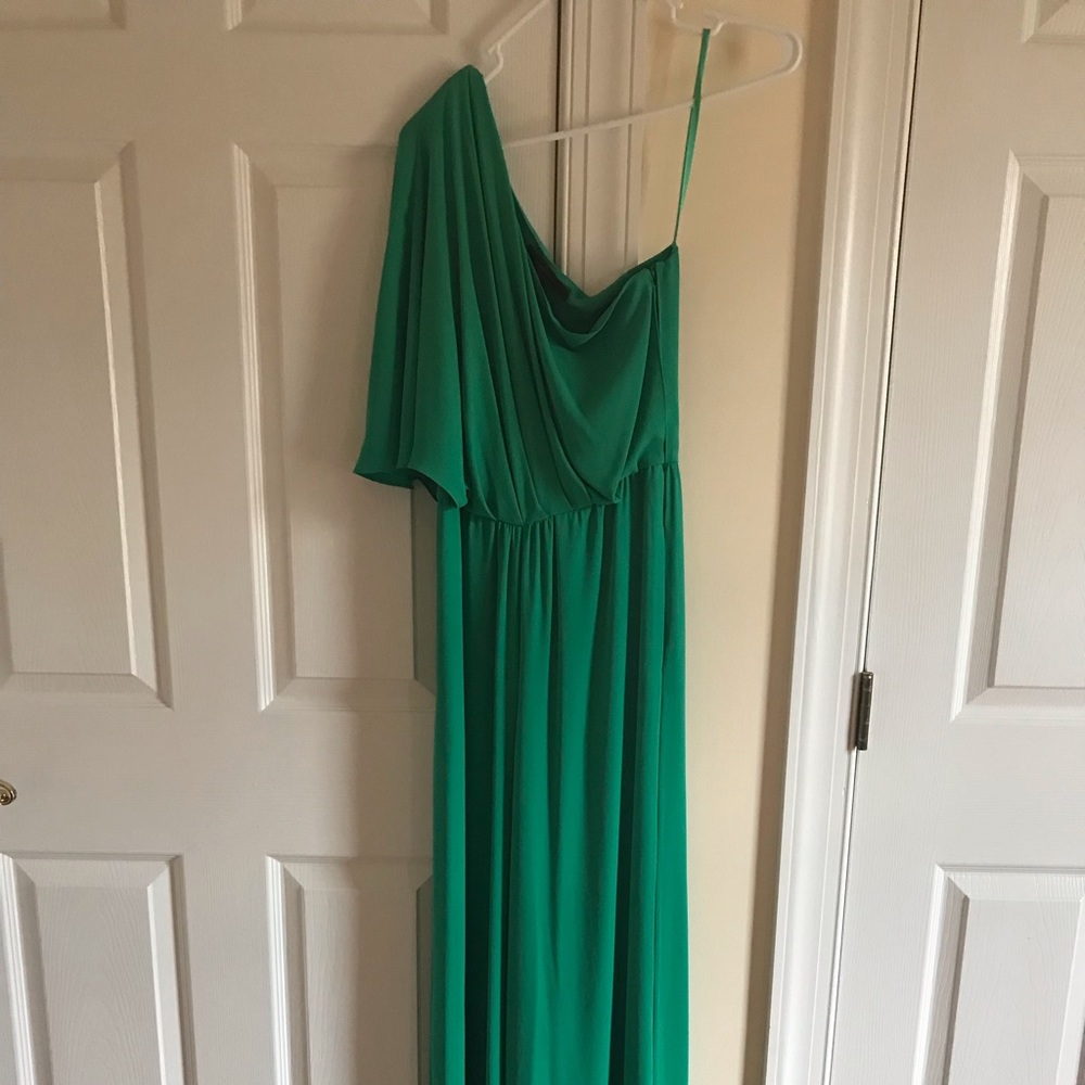 Used In excellent condition, off shoulder jumpsuit